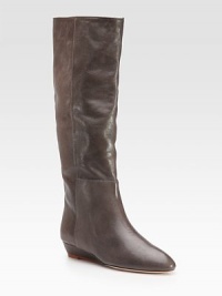 A perfect everyday leather design is made extra-sleek with a barely-there wedge heel.Covered wedge heel, 1 (25mm) Shaft, 15 Leg circumference, 15 Pull-on style Leather lining and sole Padded insole Imported A perfect everyday leather design is made extra-sleek with a barely-there wedge heel.Covered wedge heel, 1 (25mm) Shaft, 15 Leg circumference, 15 Pull-on style Leather lining and sole Padded insole Imported