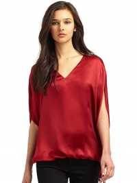 THE LOOKV necklineShort batwing sleevesBubble hem with adjustable side tiePull-on styleTHE FITAbout 27 from shoulder to hemTHE MATERIALSilkCARE & ORIGINDry cleanImportedModel shown is 5'10 (177cm) wearing US size 4. THE LOOKV necklineShort batwing sleevesBubble hem with adjustable side tiePull-on styleTHE FITAbout 27 from shoulder to hemTHE MATERIALSilkCARE & ORIGINDry cleanImportedModel shown is 5'10 (177cm) wearing US size 4.
