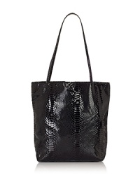 Carlos Falchi's signature tote makes practical accessorizing a must. In sturdy mircofiber with a detachable change purse, it's ideal for busy days and heavy loads. Carlos Falchi's signature tote makes practical accessorizing a must. In sturdy mircofiber with a detachable change purse, it's ideal for busy days and heavy loads.