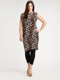 Go wild in this relaxed-yet-flattering tunic. It features draped detail at the back for an appealing look. It can be worn as a tunic or shift dress. BoatneckSleevelessBuilt-in camisolePull-on styleAllover print About 36 from shoulder to hemNylonDry cleanMade in USA Go wild in this relaxed-yet-flattering tunic. It features draped detail at the back for an appealing look. It can be worn as a tunic or shift dress. BoatneckSleevelessBuilt-in camisolePull-on styleAllover print About 36 from shoulder to hemNylonDry cleanMade in USA