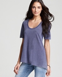 An asymmetrical hem lends dramatic flair to this essential tee from CHASER. An asymmetrical hem lends dramatic flair to this essential tee from CHASER.