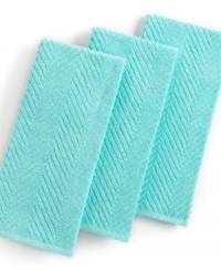 Grab style and keep function with a set of three kitchen towels that step forward in an eye-catching color to wipe up spills, aid in prep and add an accent to your space. The textured design sets a sharp appearance for any room, while the highly absorbent terry quickly cleans up. Limited lifetime warranty. Grab style and keep function with a set of three kitchen towels that step forward in an eye-catching color to wipe up spills, aid in prep and add an accent to your space. The textured design sets a sharp appearance for any room, while the highly absorbent terry quickly cleans up. Limited lifetime warranty.