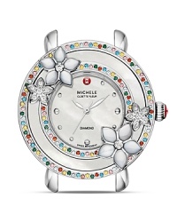 A serious luxury, for the girl who doesn't take herself too seriously. This flower-detailed Michele watch head is illuminated by diamonds and colorful gemstones, with an elegant Mother-of-Pearl dial as the complement. A serious luxury, for the girl who doesn't take herself too seriously. This flower-detailed Michele watch head is illuminated by diamonds and colorful gemstones, with an elegant Mother-of-Pearl dial as the complement.