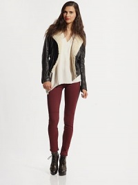 Glimmering lamb leather in a slightly cropped silhouette with a soft shearling collar and strategically placed zippers. Shearling collarZippered front slash pocketsFront zipperLong sleeves with zippered cuffsAbout 21 from shoulder to hemBody: LeatherTrim: ShearlingDry clean with fur specialistImportedFur origin: New ZealandModel shown is 5'10 (177cm) wearing US size Small. Glimmering lamb leather in a slightly cropped silhouette with a soft shearling collar and strategically placed zippers. Shearling collarZippered front slash pocketsFront zipperLong sleeves with zippered cuffsAbout 21 from shoulder to hemBody: LeatherTrim: ShearlingDry clean with fur specialistImportedFur origin: New ZealandModel shown is 5'10 (177cm) wearing US size Small.