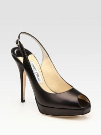 A sophisticated favorite with snipped peep toe made of fine Italian leather. Self-covered heel, 4½ (115mm) Self-covered platform, ½ (15mm) Compares to a 4 heel (100mm) Peep toe Adjustable strap Leather lining and sole Made in ItalyOUR FIT MODEL RECOMMENDS ordering true size.. A sophisticated favorite with snipped peep toe made of fine Italian leather. Self-covered heel, 4½ (115mm) Self-covered platform, ½ (15mm) Compares to a 4 heel (100mm) Peep toe Adjustable strap Leather lining and sole Made in ItalyOUR FIT MODEL RECOMMENDS ordering true size..
