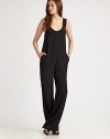 Trend-forward jumpsuit fashioned with a plunging scoopneck, slash pockets and an unexpected scoopback. Plunging scoopneckWide strapsSlash pocketsLow scoopbackInseam, about 35ViscoseDry cleanImported of Italian fabricModel shown is 5'11 (180cm) wearing US size Small.