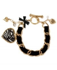 Stunning stripes. This toggle bracelet from Betsey Johnson is crafted from antique gold-tone mixed metal with a black ribbon and different accents, including a black and white zebra-striped heart for some animal attraction. Item comes packaged in a signature Betsey Johnson Gift Box. Approximate length: 7-1/2 inches. Stunning stripes. This toggle bracelet from Betsey Johnson is crafted from antique gold-tone mixed metal with a black ribbon and different accents, including a black and white zebra-striped heart for some animal attraction. Item comes packaged in a signature Betsey Johnson Gift Box. Approximate length: 7-1/2 inches.