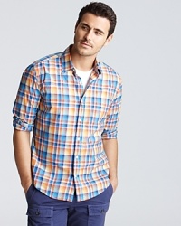 Sunny complementary colors in plaid--this classic fit sport shirt brings your monotonal layering pieces to life.