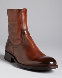 Drawing upon a tradition of excellent craftmanship, the Hawthorne is a sturdy boot in burnished leather, with side zip and slight heel. Drawing upon a tradition of excellent craftmanship, the Hawthorne is a sturdy boot in burnished leather, with side zip and slight heel.