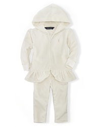 An athletic-inspired hooded-jacket-and-pant set is crafted from soft velour with tailored details and a stylish peplum hem. An athletic-inspired hooded-jacket-and-pant set is crafted from soft velour with tailored details and a stylish peplum hem.