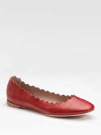 The epitome of elegance, this simple, shapely leather flat is detailed with a pretty scalloped edge.Stacked heel, ½ (15mm) Leather lining and sole Padded insole Made in ItalyOUR FIT MODEL RECOMMENDS ordering true size. The epitome of elegance, this simple, shapely leather flat is detailed with a pretty scalloped edge.Stacked heel, ½ (15mm) Leather lining and sole Padded insole Made in ItalyOUR FIT MODEL RECOMMENDS ordering true size.