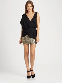 A blouson bodice and plunging back add lady-like style to this fluttery silk design with a hint of stretch. V-neckGathered sleevesBlouson bodiceGathered peplumPlunging backAbout 26 from shoulder to hemSilk/spandexDry cleanImported Model shown is 5'10 (178cm) wearing US size Small. A blouson bodice and plunging back add lady-like style to this fluttery silk design with a hint of stretch. V-neckGathered sleevesBlouson bodiceGathered peplumPlunging backAbout 26 from shoulder to hemSilk/spandexDry cleanImported Model shown is 5'10 (178cm) wearing US size Small.