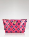 A poised Tory Burch print dresses up an essential cosmetics case, crafted in durable coated cotton.