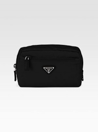 Bright colored nylon design with logo detail and leather accents.Top zip closure One outside zip pocket One inside zip pocket Fully lined 8W X 5H X 2½D Made in Italy Bright colored nylon design with logo detail and leather accents.Top zip closure One outside zip pocket One inside zip pocket Fully lined 8W X 5H X 2½D Made in Italy