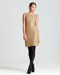 Embark on a fashion trip in a metallic MICHAEL Michael Kors Petites' sheath dress, finished with frayed seaming for a touch of tribal chic. Embark on a fashion trip in a metallic MICHAEL Michael Kors Petites' sheath dress, finished with frayed seaming for a touch of tribal chic.
