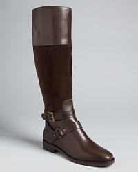 Elegant sums up these mixed-media Joan & David riding boots, with on-trend buckled ankle straps. Elegant sums up these mixed-media Joan & David riding boots, with on-trend buckled ankle straps.