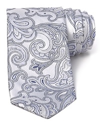 Paisley flourishes across this silk tie for a look that's boldly classic. Paisley flourishes across this silk tie for a look that's boldly classic.