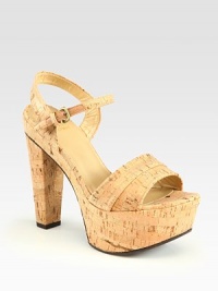 Natural cork platform sandal with a slight metallic finish and an adjustable ankle strap. Self-covered heel, 5 (125mm)Covered platform, 2 (50mm)Compares to a 3 heel (75mm)Metallic cork upperLeather liningRubber solePadded insoleImported Natural cork platform sandal with a slight metallic finish and an adjustable ankle strap. Self-covered heel, 5 (125mm)Covered platform, 2 (50mm)Compares to a 3 heel (75mm)Metallic cork upperLeather liningRubber solePadded insoleImported