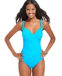Showcasing graceful lines and sleek sophistication, this swimsuit by Miraclesuit whittles your middle and exudes a carefree attitude at the same time. Showcasing graceful lines and sleek sophistication, this swimsuit by Miraclesuit whittles your middle and exudes a carefree attitude at the same time.