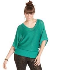 It's your time to shine in Baby Phat's sequined plus size top, showcasing a cutout back. It's your time to shine in Baby Phat's sequined plus size top, showcasing a cutout back.