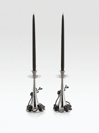 From the Black Orchid Collection. Delicately detailed in cast metal, graceful orchid stems wrap around the tapered hammered base of these striking candlesticks, adding beauty to your table or mantel.Black and polished nickel-plated metal alloyHand-finishedHolds standard tapers (not included) 11HHand washImported