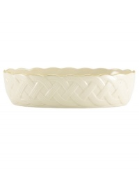 Created to commemorate the 120th anniversary of Lenox, this delightful serving bowl brings timeless elegance to any arrangement in your home. Crafted of ivory porcelain, it features a winding latticework motif, accented by a gold band at the rim. With a special 120th anniversary back stamp. From Lenox's collection of serveware and serving dishes. Created to commemorate the 120th anniversary of Lenox, this delightful serving bowl brings timeless elegance to any arrangement in your home. Crafted of ivory porcelain, it features a winding latticework motif, accented by a gold band at the rim. With a special 120th anniversary back stamp. From Lenox's collection of serveware and serving dishes.