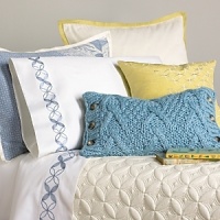 Our Arik sheet set features a serene expanse of crisp, white cotton sateen, bordered by a delicate mosaic-patterned embroidery along the flat sheet and pillowcase to match the Icelandic Dream duvet cover. Set includes flat sheet, fitted sheet and two pillowcases. Twin set includes one pillowcase. Our Arik sheet set features a serene expanse of crisp, white cotton sateen, bordered by a delicate mosaic-patterned embroidery along the flat sheet and pillowcase to match the Icelandic Dream duvet cover. Set includes flat sheet, fitted sheet and two pillowcases. Twin set includes one pillowcase.