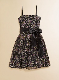 A brilliant flower print and satin sash lend an elegant touch to a pretty party frock.Square necklineAdjustable spaghetti strapsConcealed back zipperWaistband with sashFull skirtPolyester/spandexDry cleanMade in USA of imported fabric A brilliant flower print and satin sash lend an elegant touch to a pretty party frock.Square necklineAdjustable spaghetti strapsConcealed back zipperWaistband with sashFull skirtPolyester/spandexDry cleanMade in USA of imported fabric