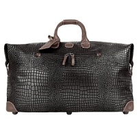 This classically styled crocodile-embossed luggage with leather trim provides the perfect pieces for any stylish traveler on the go. This classically styled crocodile-embossed luggage with leather trim provides the perfect pieces for any stylish traveler on the go.
