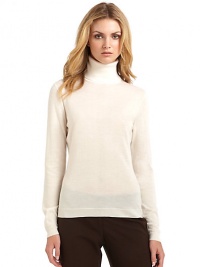 THE LOOKTurtleneckRibbed trimTHE FITAbout 22 from shoulder to hemTHE MATERIALCashmere/silkFully linedCARE & ORIGINDry cleanImportedModel shown is 5'9½ (176cm) wearing US size Small. THE LOOKTurtleneckRibbed trimTHE FITAbout 22 from shoulder to hemTHE MATERIALCashmere/silkFully linedCARE & ORIGINDry cleanImportedModel shown is 5'9½ (176cm) wearing US size Small.