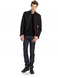 THE LOOKTailored in a scuba-like techno fabricationLamb leather stand collarConcealed front zipperTwo-button frontRaw edge detailing at collar, placket THE LOOKTailored in a scuba-like techno fabricationLamb leather stand collarConcealed front zipperTwo-button frontRaw edge detailing at collar, placket