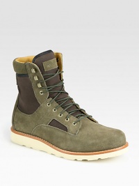 Lace-up leather high top design highlights two-toned paneling in suede and cotton canvas with a comfortable, contrasting Vibram sole.Suede/cotton upperLeather liningPadded insoleVibram soleImported Lace-up leather high top design highlights two-toned paneling in suede and cotton canvas with a comfortable, contrasting Vibram sole.Suede/cotton upperLeather liningPadded insoleVibram soleImported