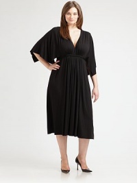 A hint of stretch ensures this modal dress offers the best fit ever. Its plunging neckline and Empire waist work in conjunction to give you a perfectly sultry look.V-neckFlutter sleevesPull-on styleSelf-tie detail at Empire waistAbout 40 from natural waist92% modal/8% spandexDry cleanMade in USA A hint of stretch ensures this modal dress offers the best fit ever. Its plunging neckline and Empire waist work in conjunction to give you a perfectly sultry look.V-neckFlutter sleevesPull-on styleSelf-tie detail at Empire waistAbout 40 from natural waist92% modal/8% spandexDry cleanMade in USA