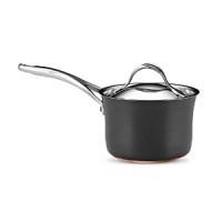 This Nouvelle cookware collection from Anolon features hard-anodized construction in a versatile, elegant shape for perfectly even heating and exceptional cooking performance. Each piece is designed with a double full cap base with a copper core for optimum heat control, and two layers of ultradurable aluminum. Restaurant-tested Autograph® 2 nonstick interiors ensure easy, clean release, and cast stainless-steel handles secured with sturdy dual rivets make each piece easy to maneuver and transport. This Nouvelle cookware collection from Anolon features hard-anodized construction in a versatile, elegant shape for perfectly even heating and exceptional cooking performance. Each piece is designed with a double full cap base with a copper core for optimum heat control, and two layers of ultradurable aluminum. Restaurant-tested Autograph® 2 nonstick interiors ensure easy, clean release, and cast stainless-steel handles secured with sturdy dual rivets make each piece easy to maneuver and transport.