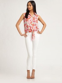 Classic tank in a spirit-lifting floral print with a point collar, button front and tied hem. Point collarButton frontSleevelessFront-tie hemRayonDry cleanImportedModel shown is 5'10 (177cm) wearing US size Small. Classic tank in a spirit-lifting floral print with a point collar, button front and tied hem. Point collarButton frontSleevelessFront-tie hemRayonDry cleanImportedModel shown is 5'10 (177cm) wearing US size Small.