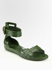 Casual-cool rubber style with an adjustable, wrap-around ankle strap. Rubber upperRubber solePadded insoleMade in ItalyOUR FIT MODEL RECOMMENDS ordering true whole size; ½ sizes should order the next whole size down Casual-cool rubber style with an adjustable, wrap-around ankle strap. Rubber upperRubber solePadded insoleMade in ItalyOUR FIT MODEL RECOMMENDS ordering true whole size; ½ sizes should order the next whole size down