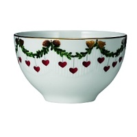 With its elegant depictions of pine garlands, red ribbons and traditional Christmas ornaments, Royal Copenhagen's fine bone-china serveware is the perfect backdrop to a joyous holiday celebration. A well-loved classic, the Star Fluted design was first produced in 1895. With its elegant depictions of pine garlands, red ribbons and traditional Christmas ornaments, Royal Copenhagen's fine bone-china serveware is the perfect backdrop to a joyous holiday celebration. A well-loved classic, the Star Fluted design was first produced in 1895.
