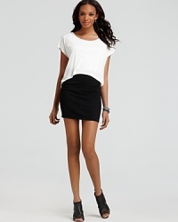 A two-in-one look with downtown attitude, this Aqua dress features a sleek bandage skirt and attached cropped tee that masters urban minimalism without high maintenance details. A two-in-one look with downtown attitude, this Aqua dress features a sleek bandage skirt and attached cropped tee that masters urban minimalism without high maintenance details.