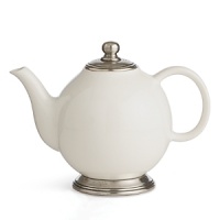 Fine vivid white ceramic is accented by hand with delicate pewter accents to create this gracefully versatile teapot from Arte Italica. Fine vivid white ceramic is accented by hand with delicate pewter accents to create this gracefully versatile teapot from Arte Italica.