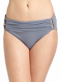THE LOOKRuched elastic top bandSix silvery bead accents with cutout detailsElastic leg openingsTHE MATERIAL87% nylon/13% spandexFully linedCARE & ORIGINHand washImportedPlease note: Bikini top sold separately. THE LOOKRuched elastic top bandSix silvery bead accents with cutout detailsElastic leg openingsTHE MATERIAL87% nylon/13% spandexFully linedCARE & ORIGINHand washImportedPlease note: Bikini top sold separately.