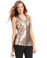 Calvin Klein's sequined top is a festive piece to layer or wear solo. Calvin Klein's sequined top is a festive piece to layer or wear solo.