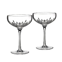 Exuding classic glamour, the Lismore Essence Collector's Edition saucer champagne glass features the Lismore pattern's diamond-like facets. Exuding classic glamour, the Lismore Essence Collector's Edition saucer champagne glass features the Lismore pattern's diamond-like facets.