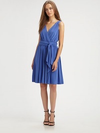 An ultra-feminine frock of fine matte jersey, gathered throughout with a gorgeous wrapped bodice.Crossover V necklineSleevelessWrap-around sashGathered skirtAbout 25 from natural waist69% acetate/23% nylon/8% spandexDry cleanImported An ultra-feminine frock of fine matte jersey, gathered throughout with a gorgeous wrapped bodice.Crossover V necklineSleevelessWrap-around sashGathered skirtAbout 25 from natural waist69% acetate/23% nylon/8% spandexDry cleanImported