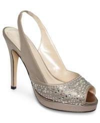 What a lovely addition to your shoe wardrobe. The Ebony evening platform pumps by Caparros feature a slingback heel and jeweled detailing on the vamp. What a lovely addition to your shoe wardrobe. The Ebony evening platform pumps by Caparros feature a slingback heel and jeweled detailing on the vamp.