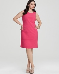 A body-skimming Calvin Klein sheath dress gets an edgy update with strategic zippers along the paneled design. Accentuate the metallic sentiment with coordinating earrings. A body-skimming Calvin Klein sheath dress gets an edgy update with strategic zippers along the paneled design. Accentuate the metallic sentiment with coordinating earrings.