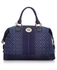 Signature style takes center stage with this preppy-chic bowler bag from Tommy Hilfiger. Adorned with the iconic TH monogram and gleaming hardware, its generous interior stows all your day-to-night essentials with ease.