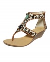 Animal prints and jewels make a perfect pair. Slip on the Malorie wedge sandals and take a walk on the wild side.