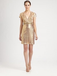 Allover pleats and a beaded waistband dress up this shimmering design.V necklineCap sleevesBeaded waistbandBack tieConcealed back zipFully linedAbout 19 from natural waistPolyesterDry cleanMade in USA of imported fabricModel shown is 5'10 (177cm) wearing US size Small. Allover pleats and a beaded waistband dress up this shimmering design.V necklineCap sleevesBeaded waistbandBack tieConcealed back zipFully linedAbout 19 from natural waistPolyesterDry cleanMade in USA of imported fabricModel shown is 5'10 (177cm) wearing US size Small.