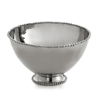 Marked by incredible handcrafting, this serving bowl features a rim embellished with countless molten beads carefully placed by a highly skilled artisan. The look is streamlined, timeless, organic and soulful. Marked by incredible handcrafting, this serving bowl features a rim embellished with countless molten beads carefully placed by a highly skilled artisan. The look is streamlined, timeless, organic and soulful.