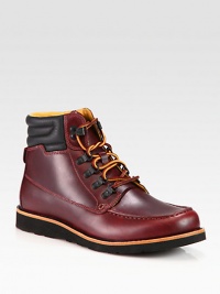 Classic moccasin toe and padded collar shapes and defines this structured wedge boot, crafted in smooth leather with a rugged Vibram sole for optimal performance and comfort.Leather upperLeather liningPadded insoleRubber soleMade in Italy Classic moccasin toe and padded collar shapes and defines this structured wedge boot, crafted in smooth leather with a rugged Vibram sole for optimal performance and comfort.Leather upperLeather liningPadded insoleRubber soleMade in Italy